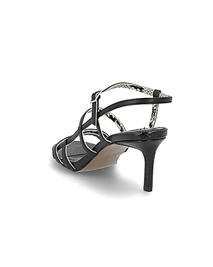 360 degree animation of product Black caged skinny heel sandals frame-7