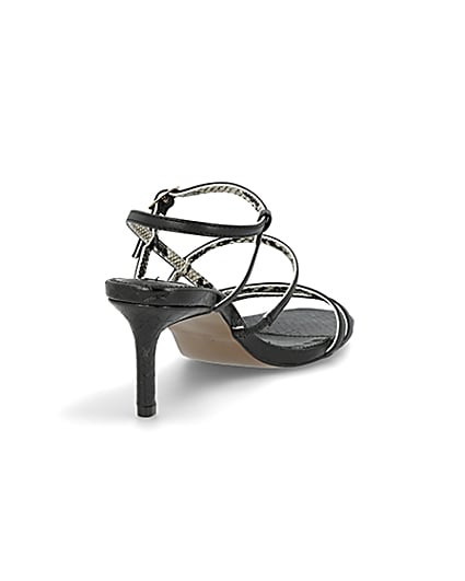 360 degree animation of product Black caged skinny heel sandals frame-11