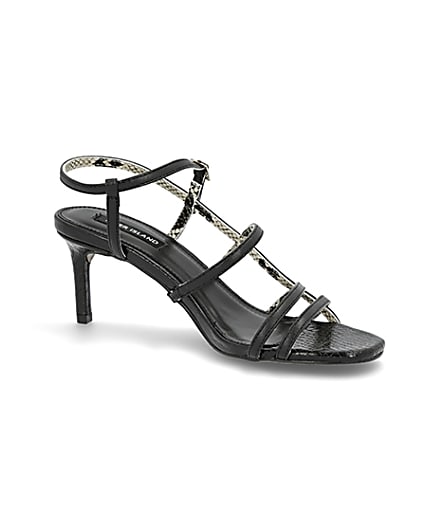 360 degree animation of product Black caged skinny heel sandals frame-17