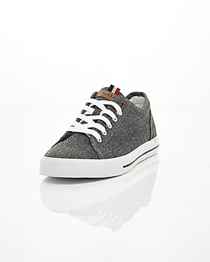 360 degree animation of product Black canvas lace-up plimsolls frame-2