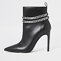 Black chain high heel boots