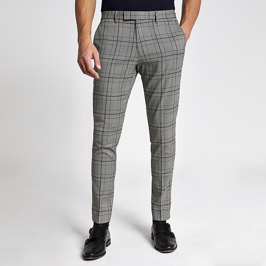 Black check stretch skinny suit trousers | River Island