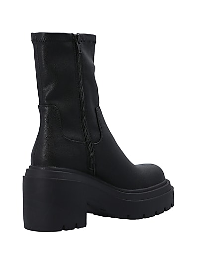 360 degree animation of product Black chunky sole anke boots frame-12