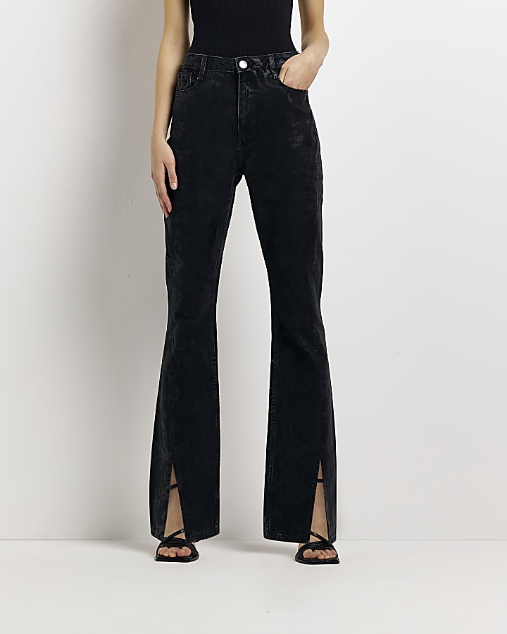 Black coated high waisted flared jeans
