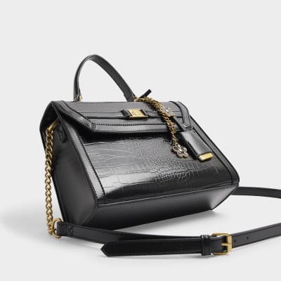 Black croc embossed cross body top handle bag River Island