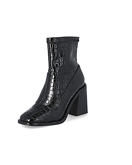 360 degree animation of product Black croc embossed heeled ankle boots frame-0