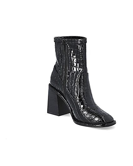 360 degree animation of product Black croc embossed heeled ankle boots frame-18
