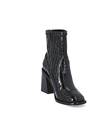 360 degree animation of product Black croc embossed heeled ankle boots frame-19