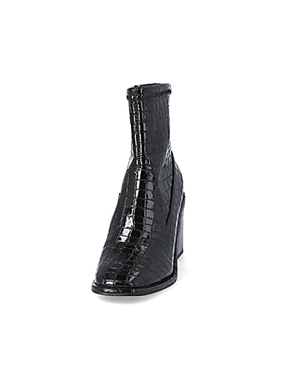 360 degree animation of product Black croc embossed heeled ankle boots frame-22