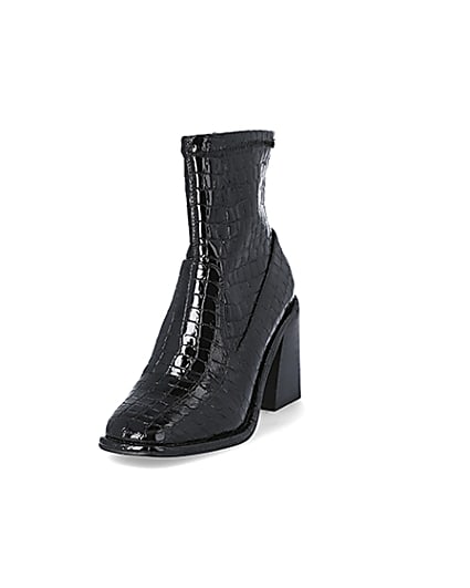 360 degree animation of product Black croc embossed heeled ankle boots frame-23