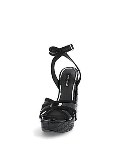 360 degree animation of product Black croc embossed strap platform heels frame-22