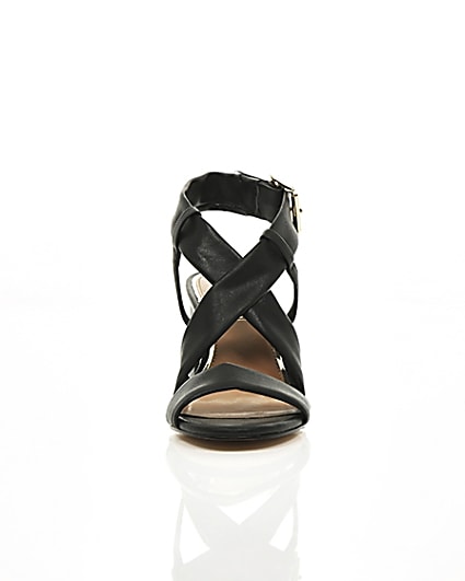 360 degree animation of product Black cross strap block heel sandals frame-4