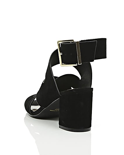 360 degree animation of product Black crossover wide fit block heel sandals frame-17