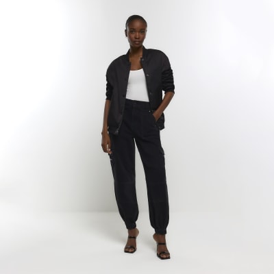 Black cuffed cargo jeans River Island