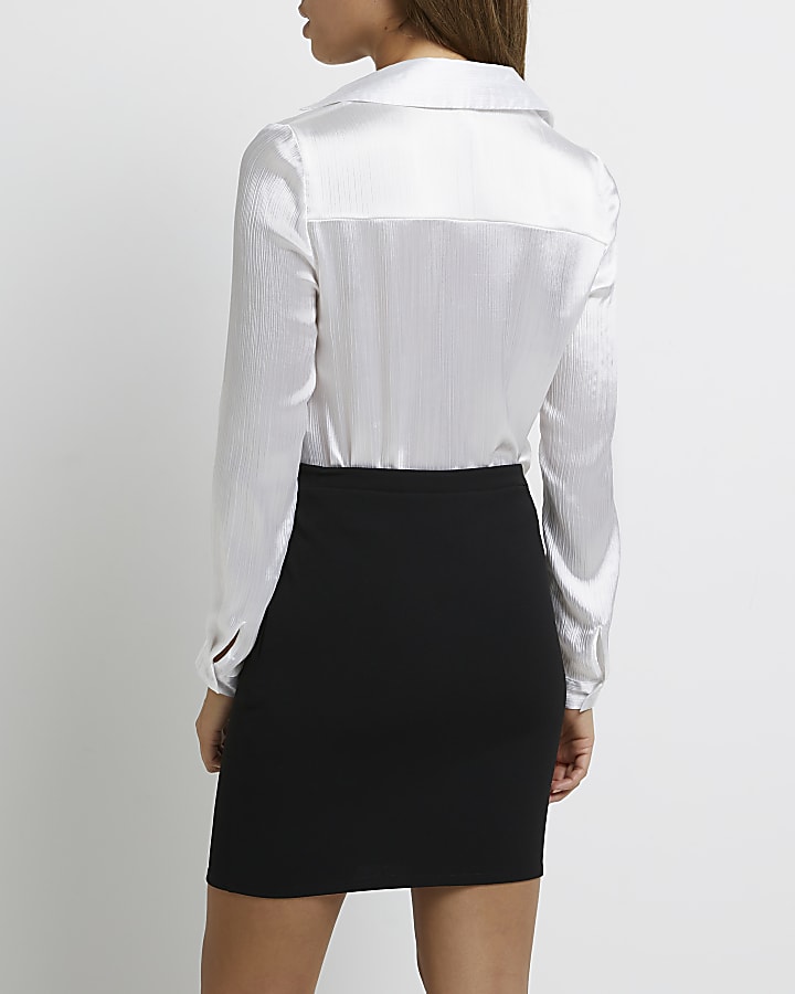 Black cut out mini skirt
