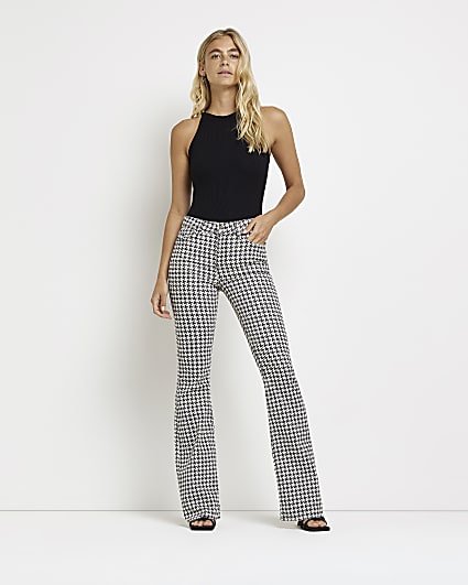 Black dogtooth mid rise flared jeans