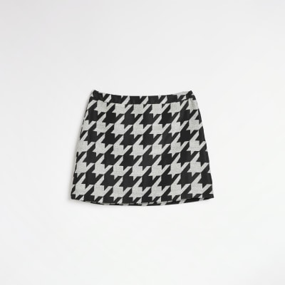 Black dogtooth mini skirt River Island