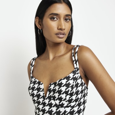 Black dogtooth slip mini dress River Island