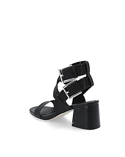 360 degree animation of product Black double buckle block heel sandals frame-6
