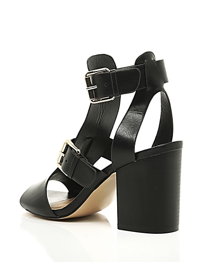 360 degree animation of product Black double buckle heels frame-19
