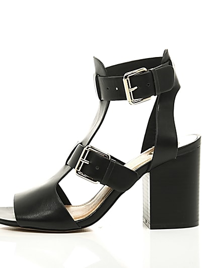 360 degree animation of product Black double buckle heels frame-22