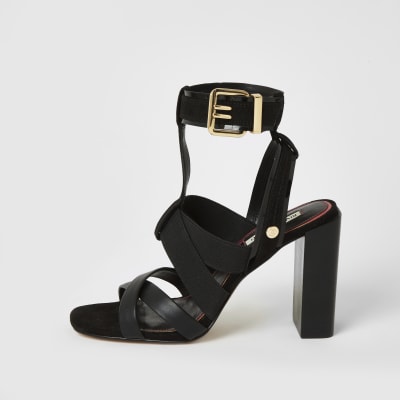 Black elasticated strap block heel 