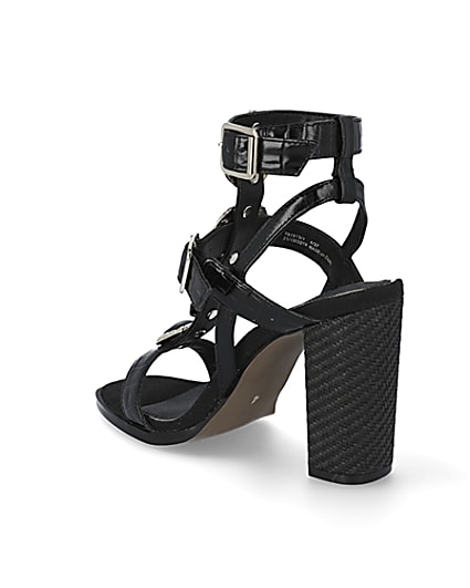 360 degree animation of product Black embellish gladiator block heel sandals frame-6