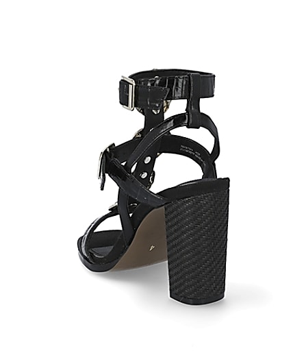 360 degree animation of product Black embellish gladiator block heel sandals frame-7
