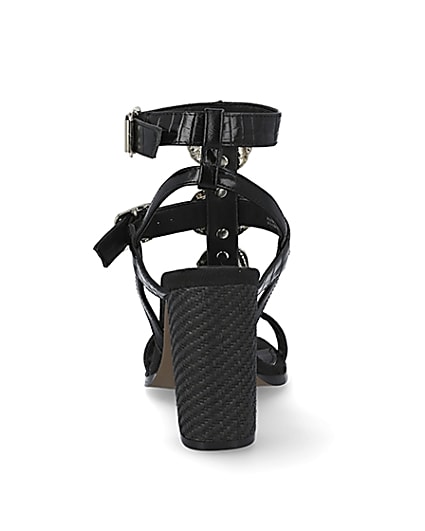 360 degree animation of product Black embellish gladiator block heel sandals frame-9