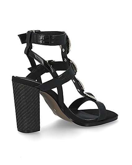 360 degree animation of product Black embellish gladiator block heel sandals frame-13