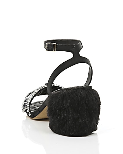 360 degree animation of product Black embellished faux fur block heel sandals frame-17