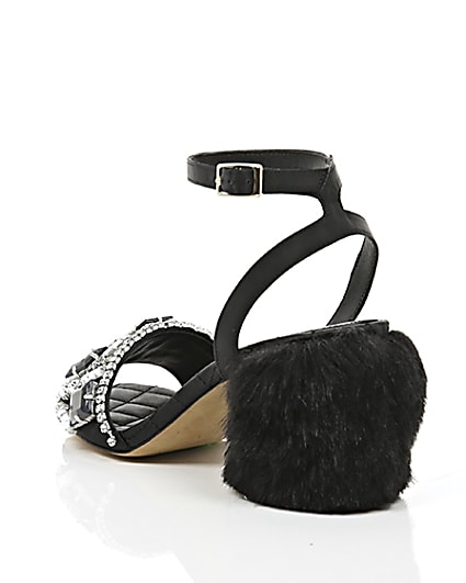 360 degree animation of product Black embellished faux fur block heel sandals frame-18