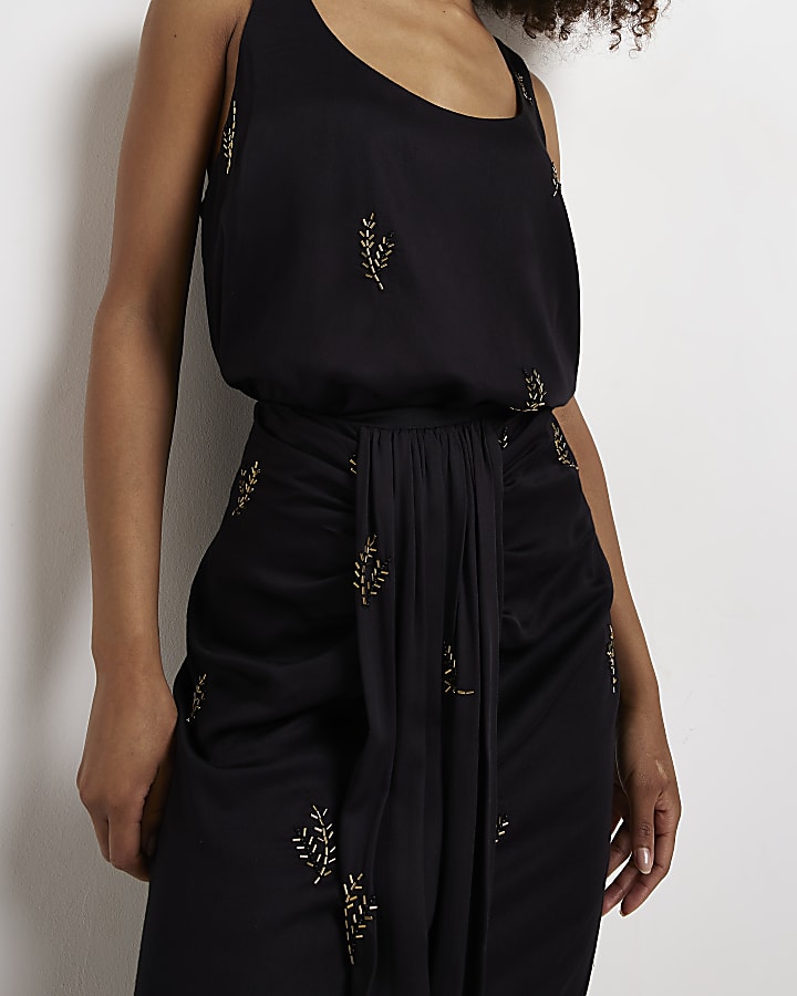 Black embellished midi skirt