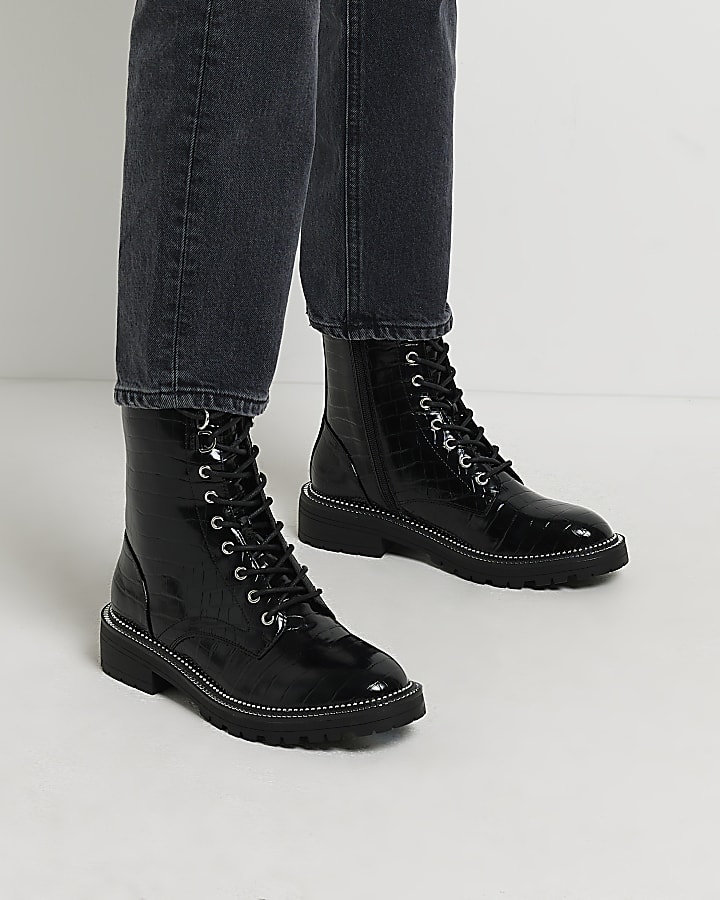 Black embossed biker boots