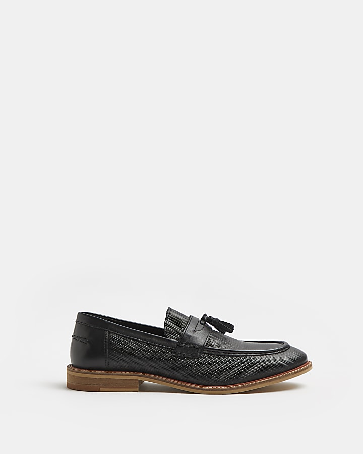 Black embossed leather tassel loafers
