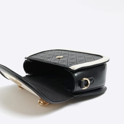 Black embossed mini cross body bag River Island