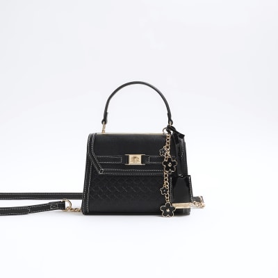 Black embossed mini top handle cross body bag