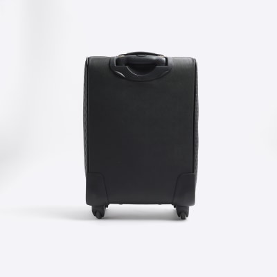 Black embossed RI monogram suitcase River Island