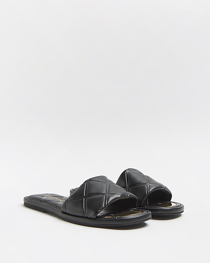 Black embossed sandals
