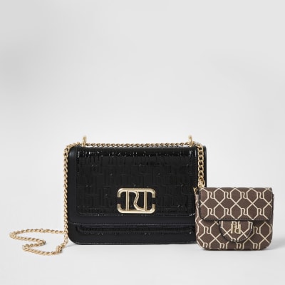 Black embossed satchel with detachable pouch