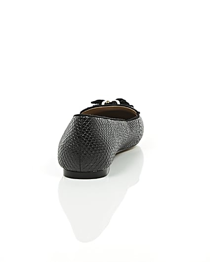 360 degree animation of product Black embossed snakeskin tassel loafers frame-15