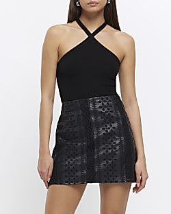 Black embroidered cut out detail mini skirt