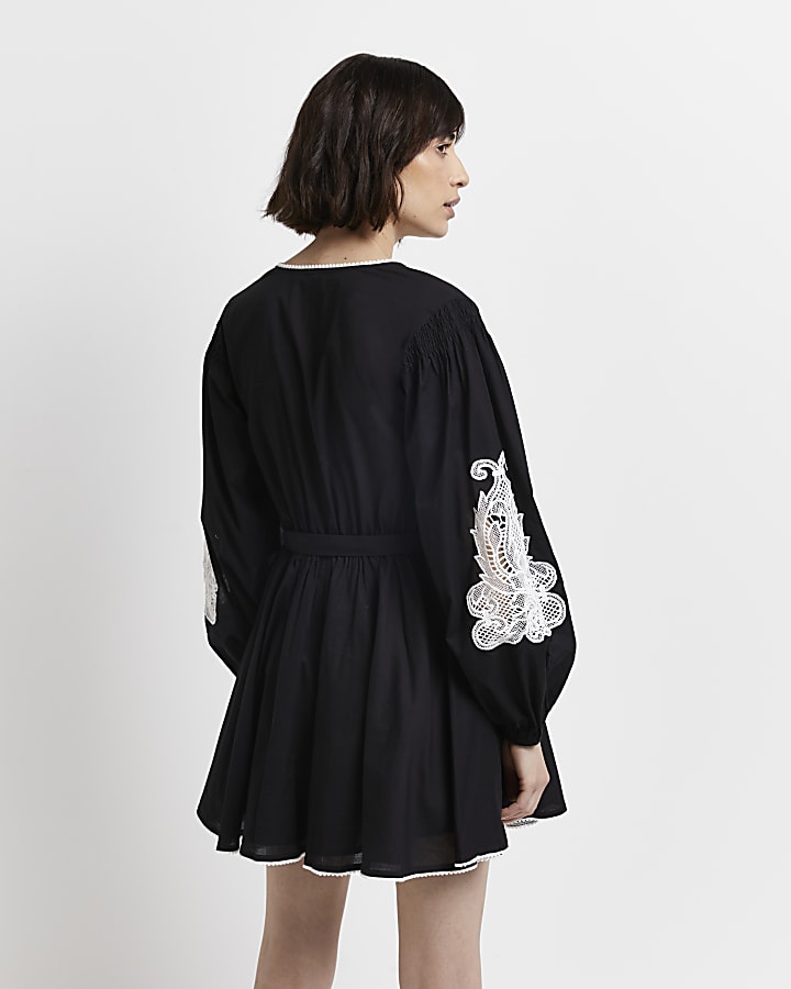 Black embroidered wrap mini dress