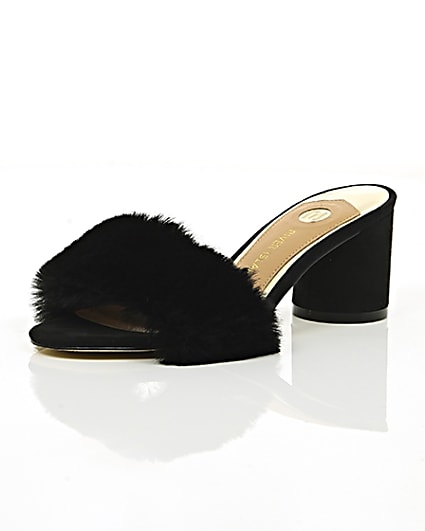 360 degree animation of product Black faux fur block heel mules frame-0