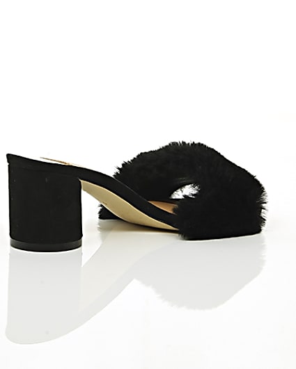 360 degree animation of product Black faux fur block heel mules frame-12