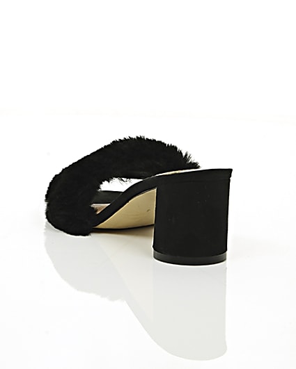 360 degree animation of product Black faux fur block heel mules frame-17