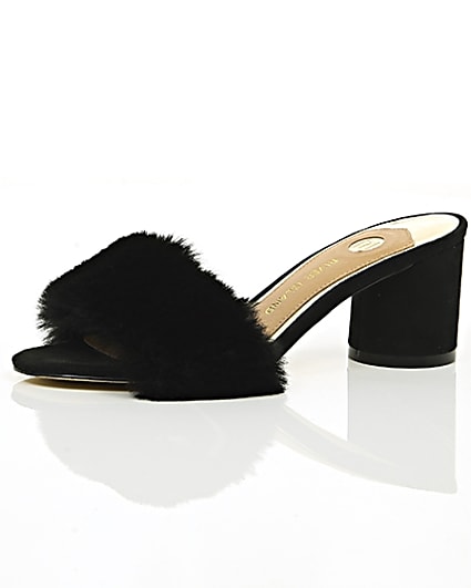 360 degree animation of product Black faux fur block heel mules frame-23