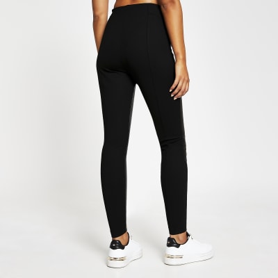 Black faux leather and ponte leggings