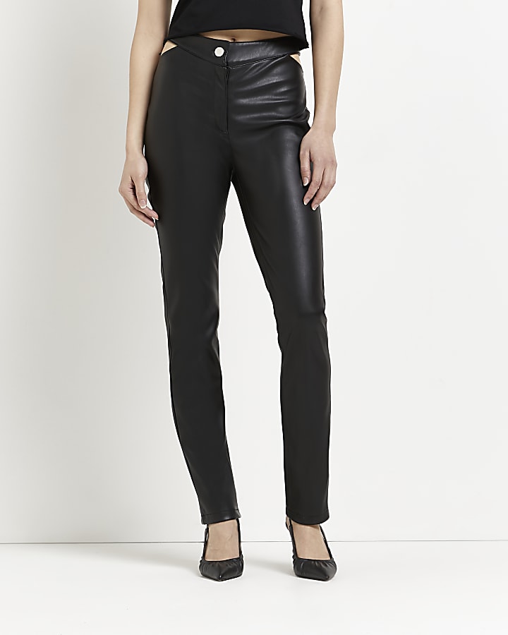Black faux leather cut out flared trousers