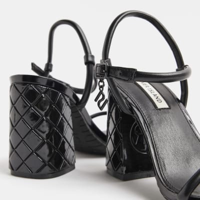Black faux leather heeled sandals
